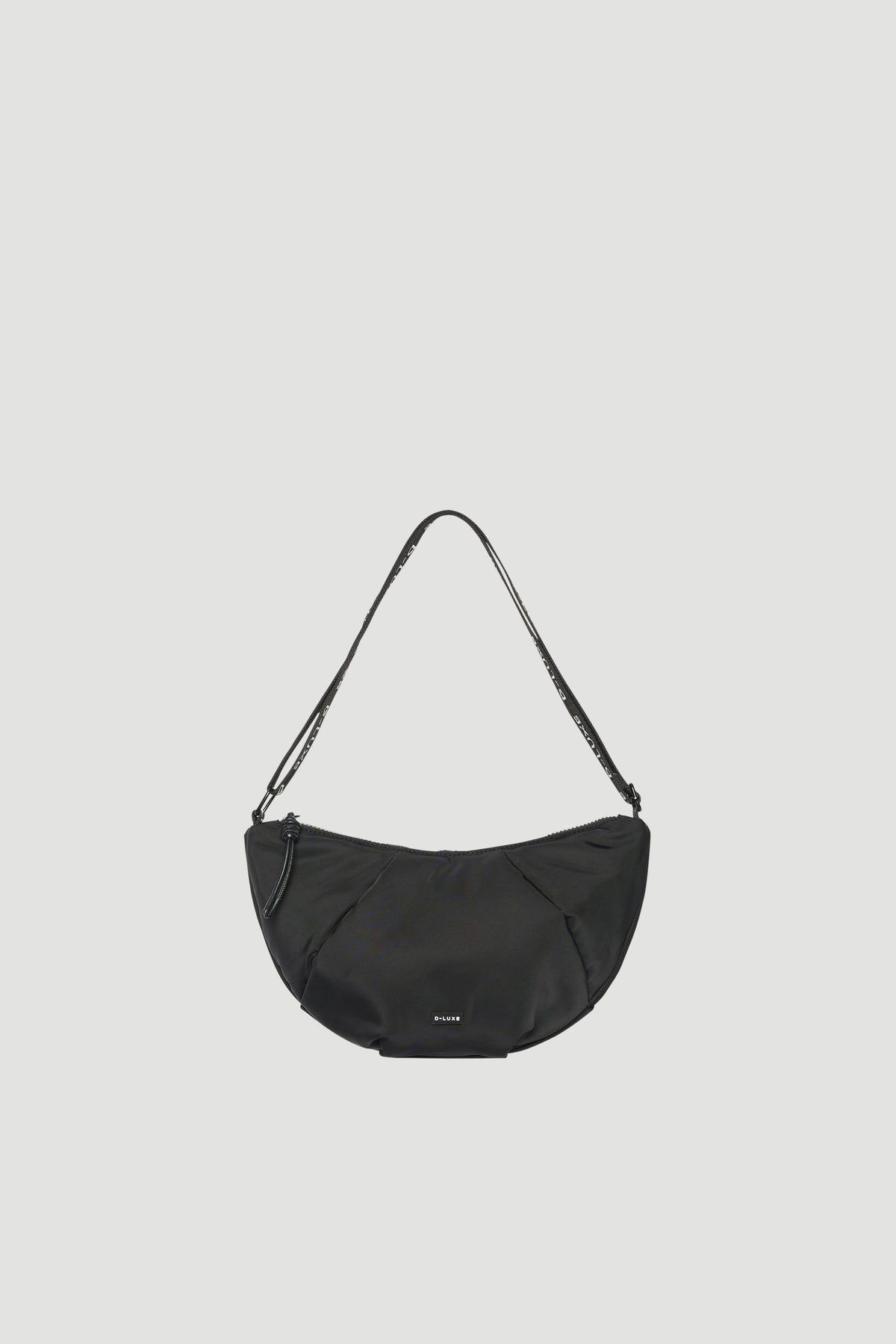 Black medium puffed crossbody bag with a curved shape and adjustable shoulder strap