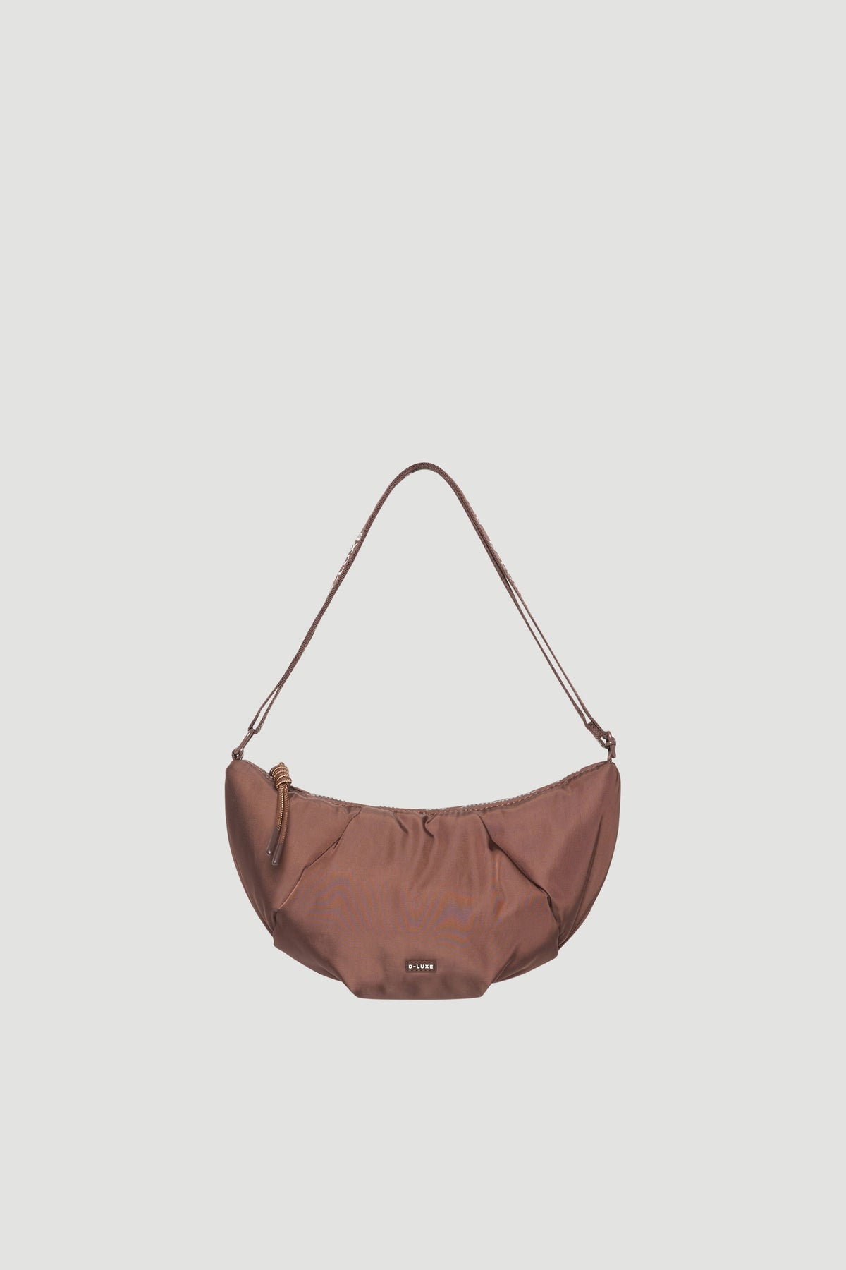 Brown medium puffed crossbody bag with a curved shape and adjustable strap