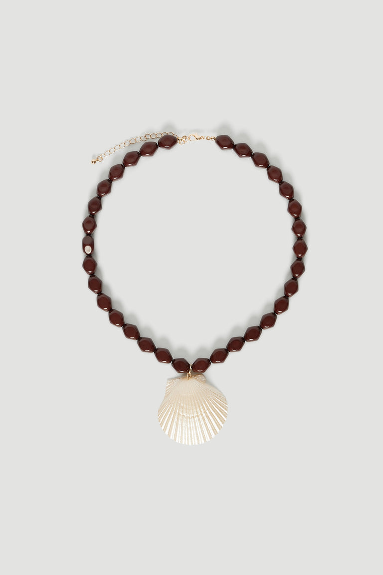 Chocolate brown stone necklace with a delicate shell pendant