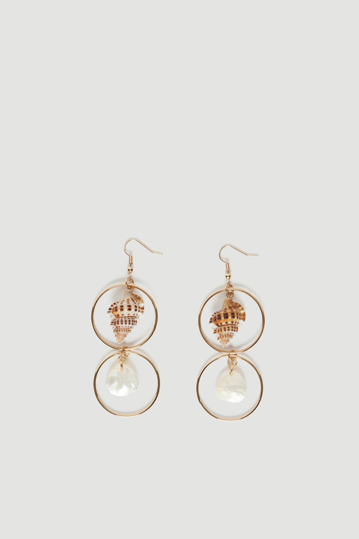 Pair of gold circle drop earrings with speckled shell and mother of pearl details