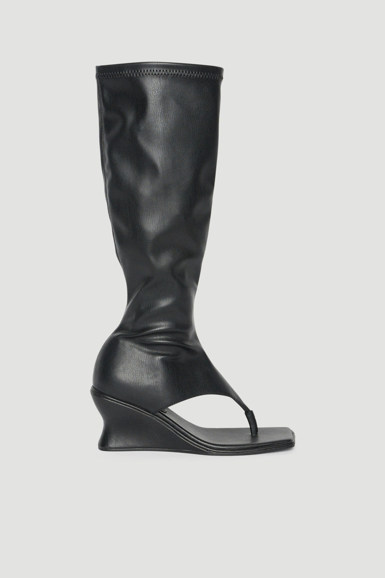 Black mid calf wedge boot with thong front and inside ankle zip