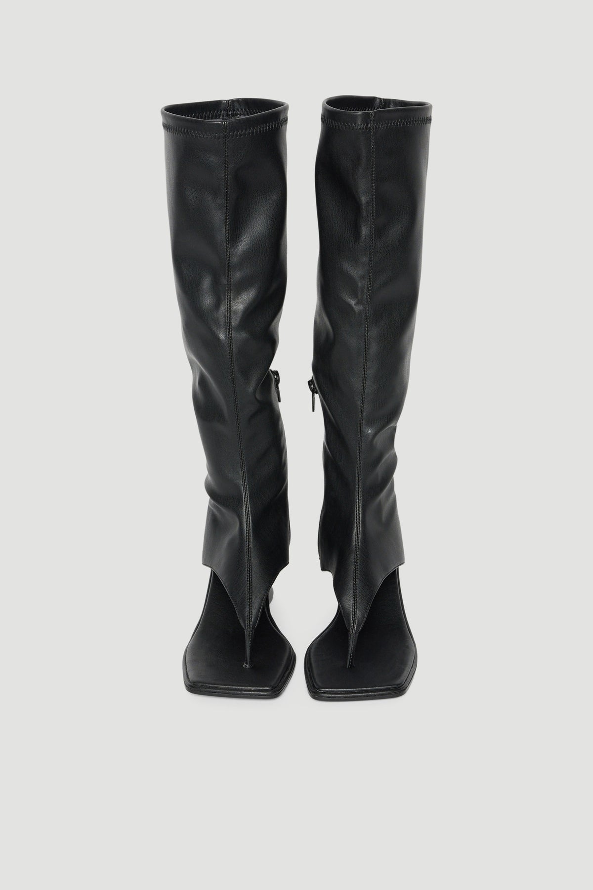 Black mid-calf wedge boots with thong front detail, square toes and inner ankle zippers