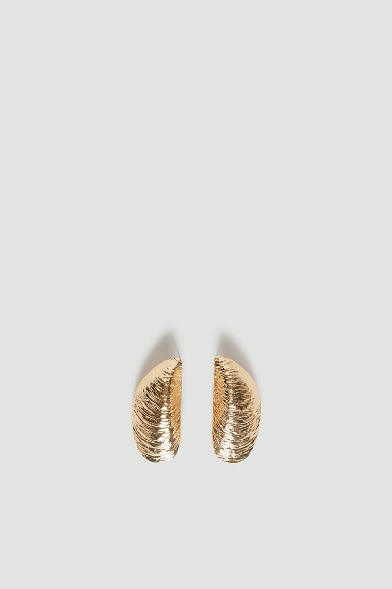 Textured gold shell stud earrings with high shine finish and medium weight design