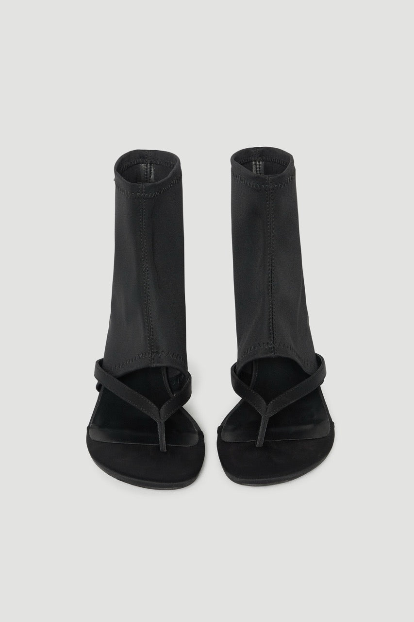 Black ankle length thong heels with stretchy shafts and slim heels