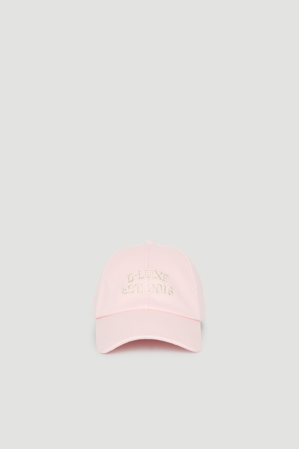 Pink baseball cap with embroidered D-Luxe logo and curved brim