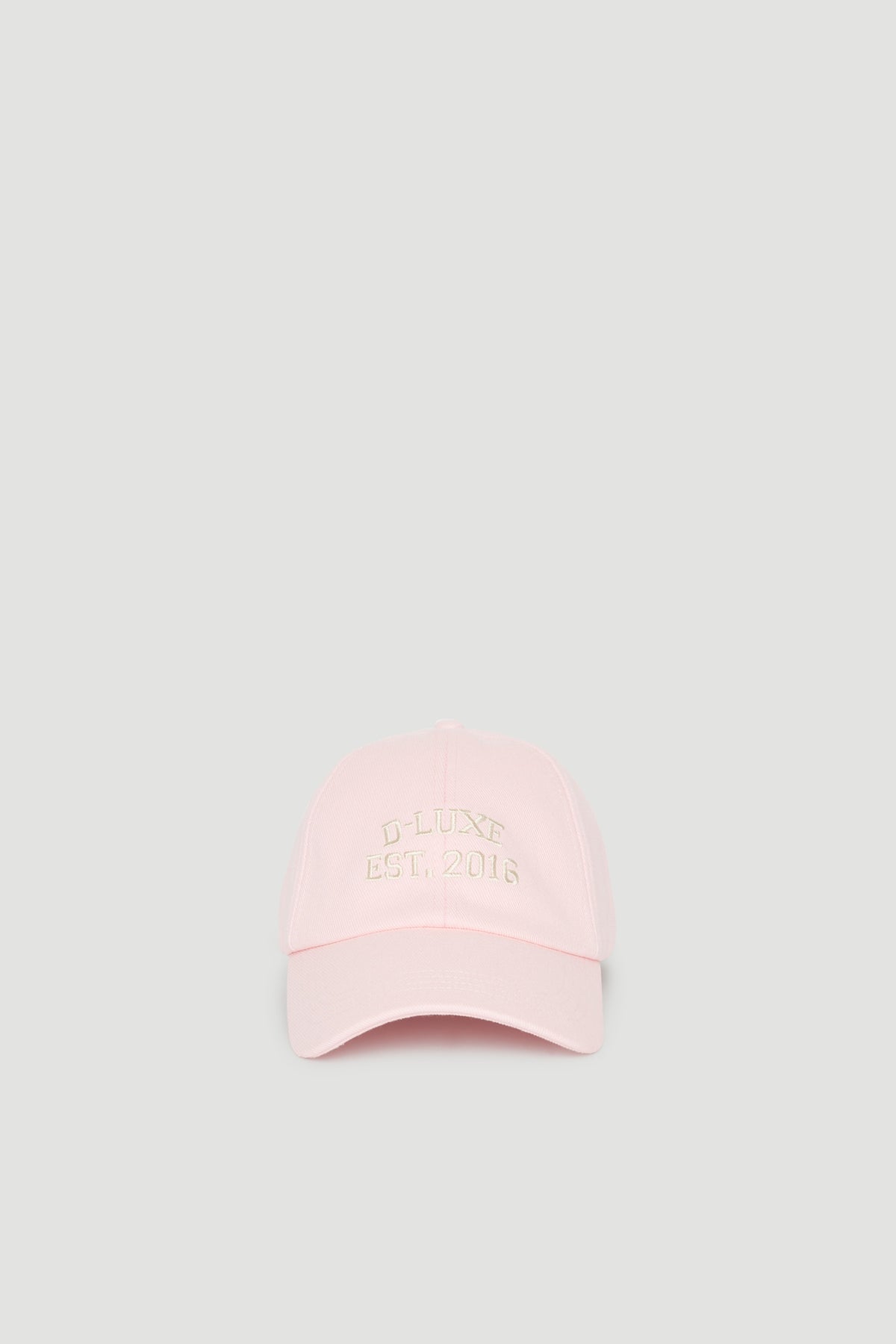 Pink baseball cap with embroidered D-Luxe logo and curved brim
