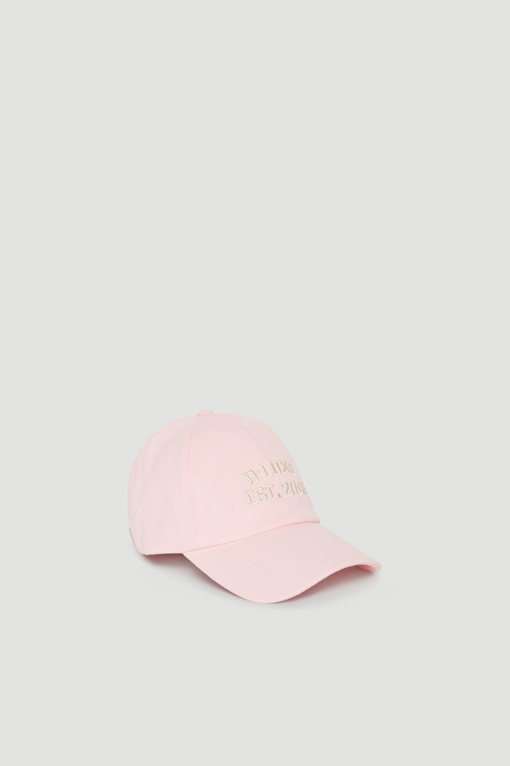 Pink baseball cap with embroidered logo and curved brim