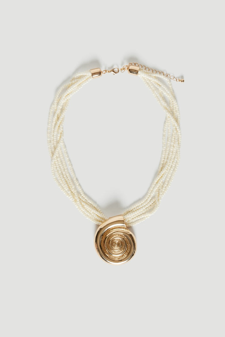 Layered pearlescent shell bead necklace with a gold tone circular pendant and lobster clasp