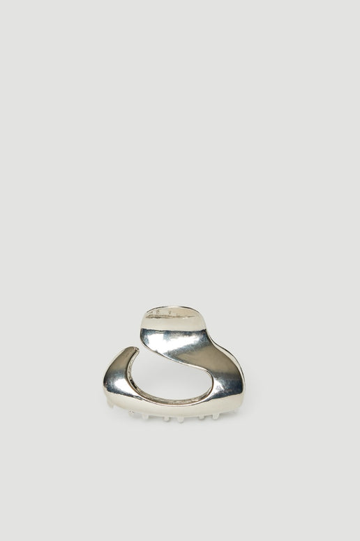 Small high shine silver oval hair claw with a sculptural curved design