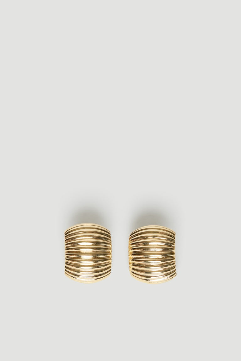 Pair of gold ribbed statement earrings with rounded horizontal ridges