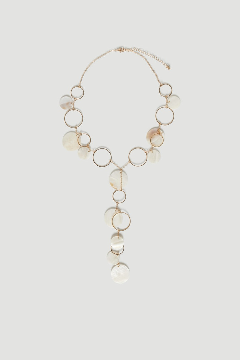 Layered gold lariat necklace with pearlescent shell charms and tiered hoop details
