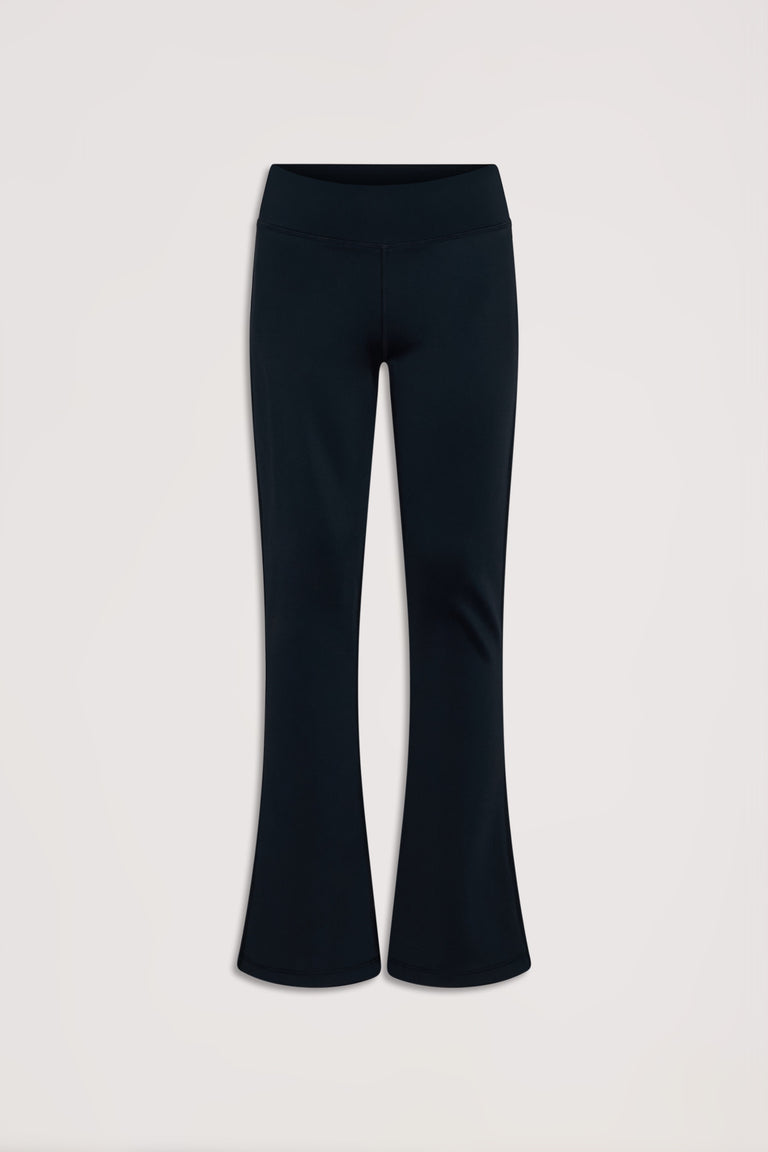 Black stretch yoga pants for girls featuring a comfortable high waistband and subtle flared legs for active days.