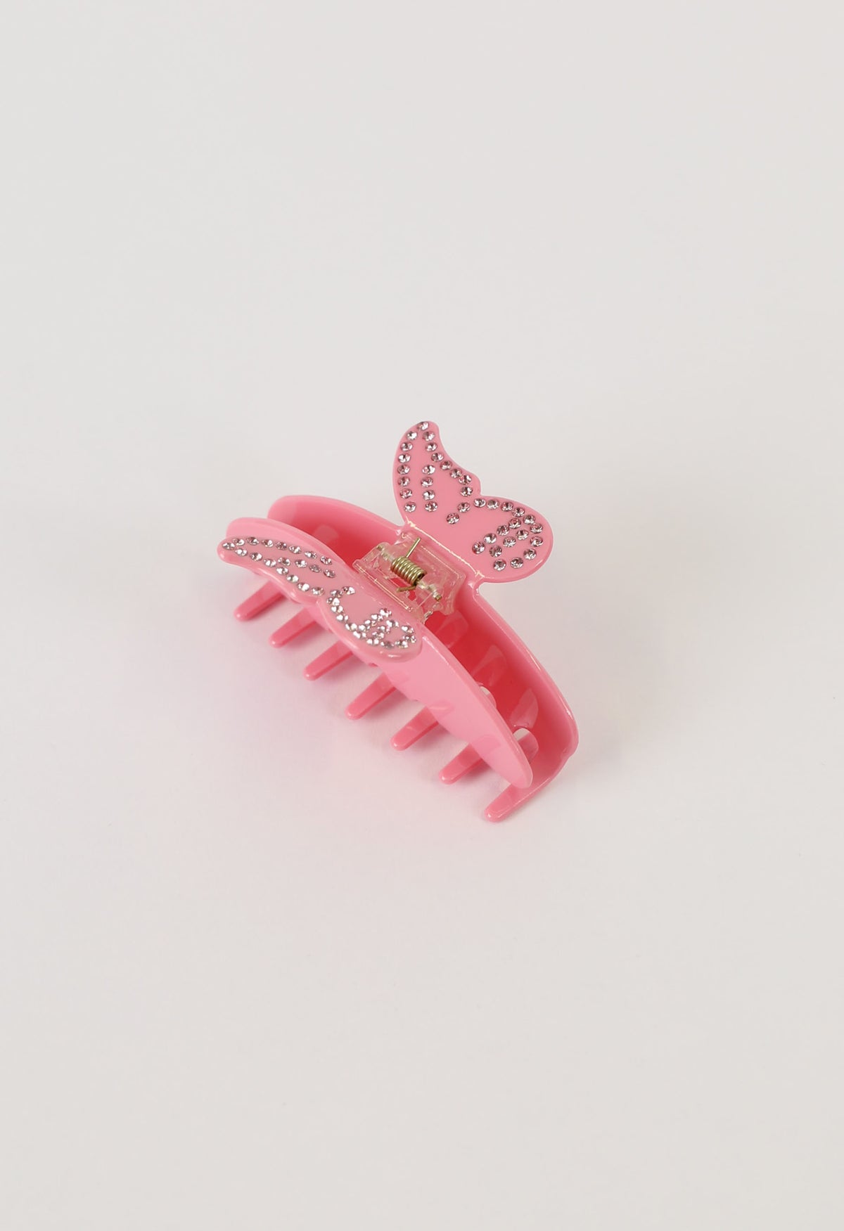Pink butterfly hair claw clip embellished with sparkling diamante stones