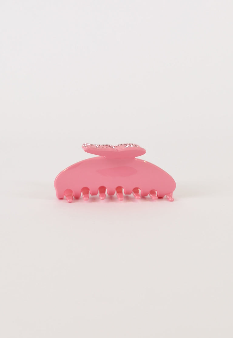 Pink butterfly hair claw with sparkling diamante detail and a spring closure