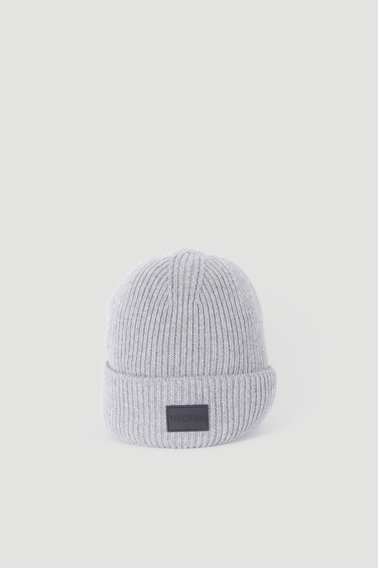 Light grey ribbed knit beanie with a folded cuff and minimal textured design for everyday comfort.