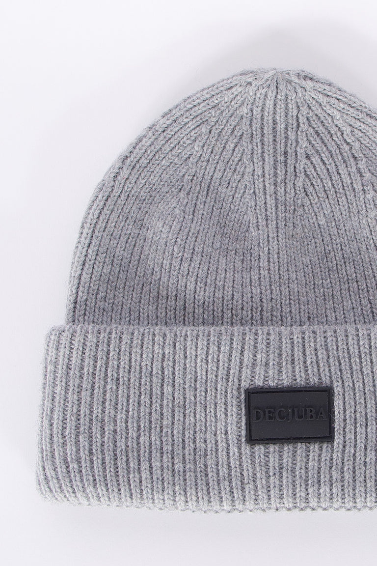 Soft grey ribbed knit beanie with a folded cuff and subtle branded patch, minimalist style for girls.
