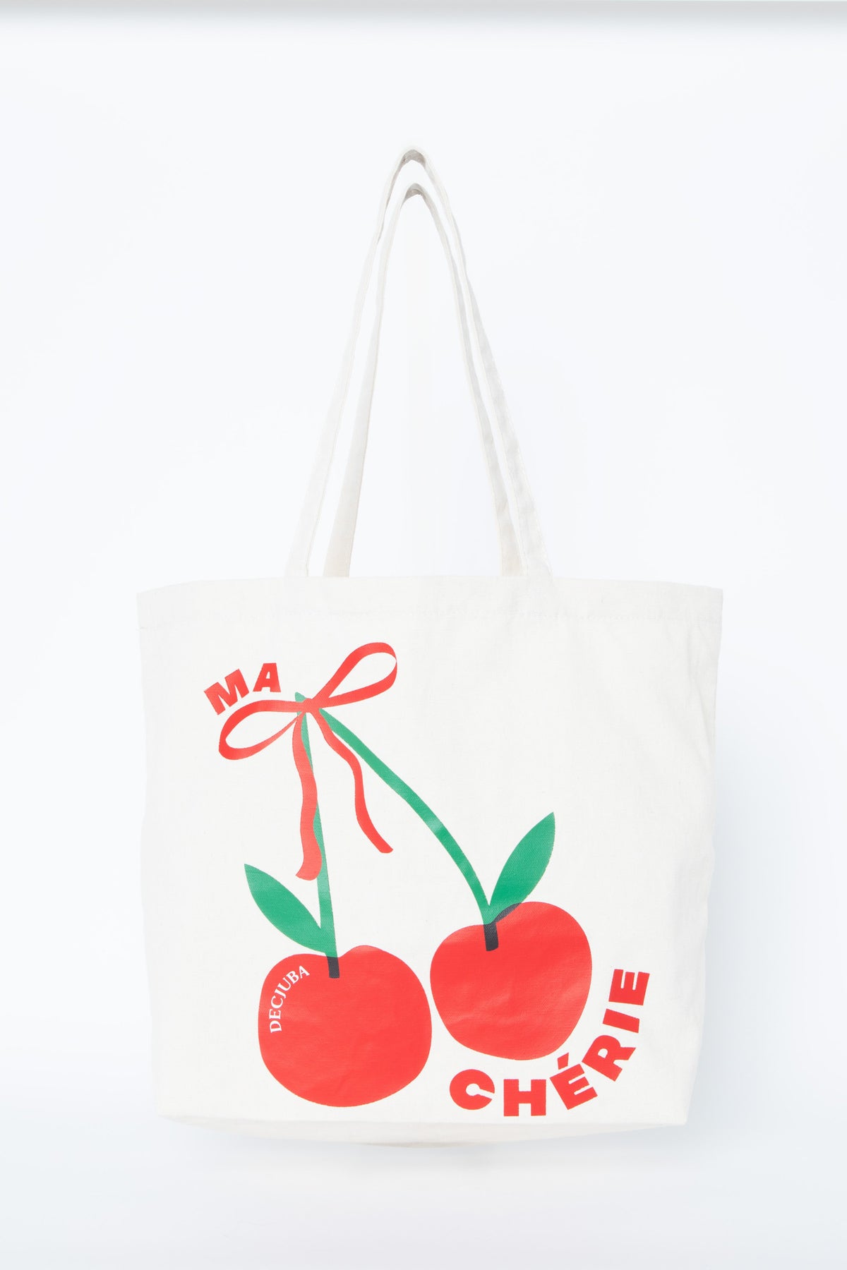 White canvas tote bag with colorful cherry graphic and Ma Cherie lettering