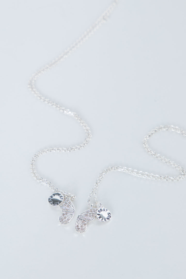 Delicate butterfly necklace with shimmering butterfly charms on a fine chain