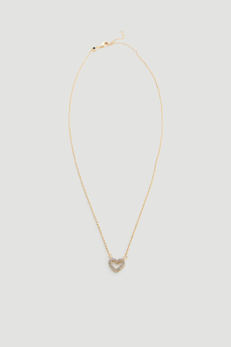 Delicate gold necklace featuring a small heart pendant adorned with sparkling stones for a subtle touch of elegance