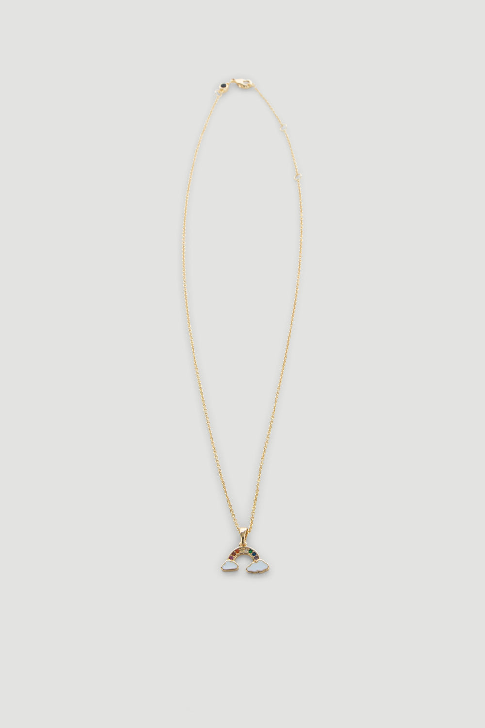 Delicate 9ct gold necklace featuring a small rainbow pendant with colorful enamel and cloud details