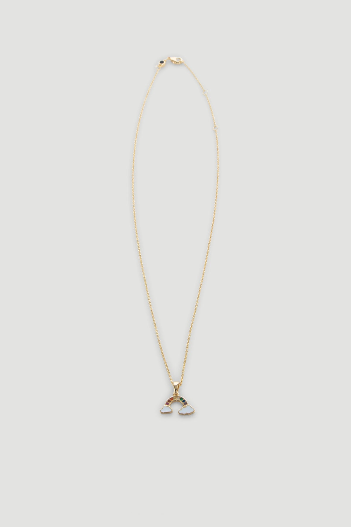 Delicate 9ct gold necklace featuring a small rainbow pendant with colorful enamel and cloud details