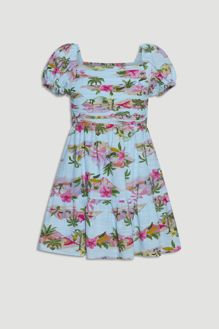 Light blue mini dress with puff sleeves and vibrant tropical floral and palm tree print for girls.