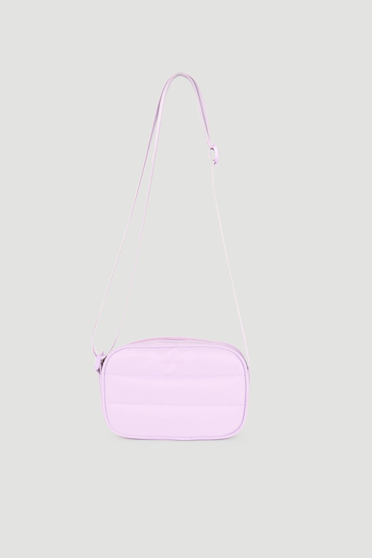 Lilac padded crossbody bag for girls with adjustable strap and smooth minimal design.