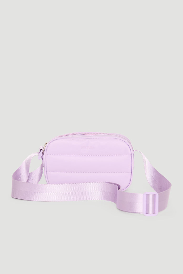 Lilac padded small crossbody bag with adjustable satin strap, designed for effortless everyday style.