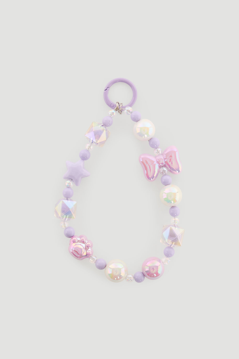 Lilac and pastel beaded charm accessory featuring stars, bows, and pearl-like beads with a circular clip.