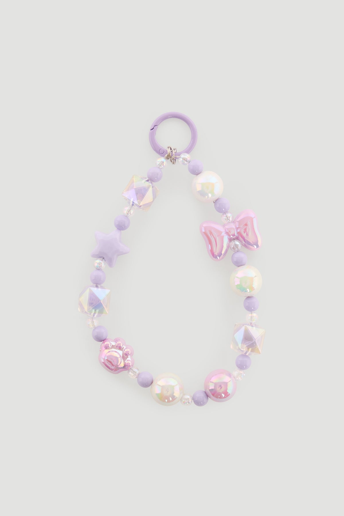 Lilac and pastel beaded charm accessory featuring stars, bows, and pearl-like beads with a circular clip.