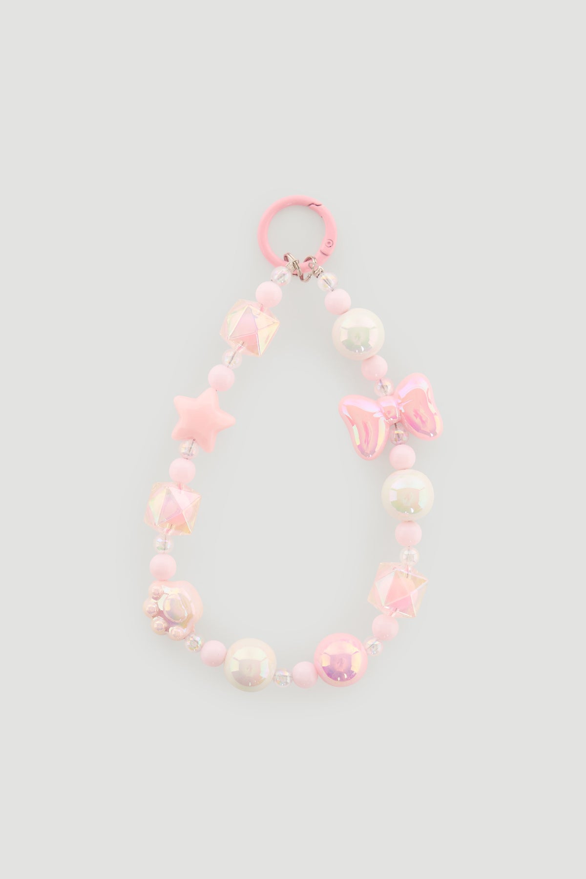 Pink beaded charm with star, bow, and pearl-like beads designed for girls’ bags or accessories.