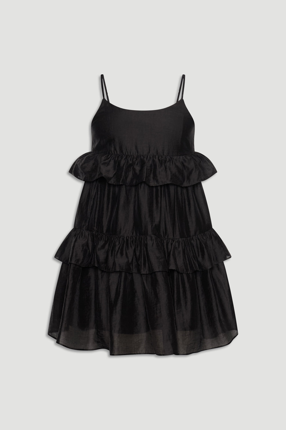 Black sleeveless girls dress with delicate spaghetti straps and layered ruffle detailing for a playful look
