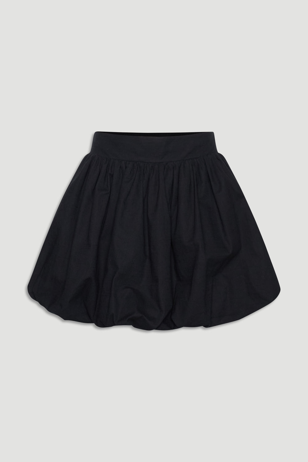Black bubble mini skirt for girls featuring a gathered waist and voluminous silhouette for playful style