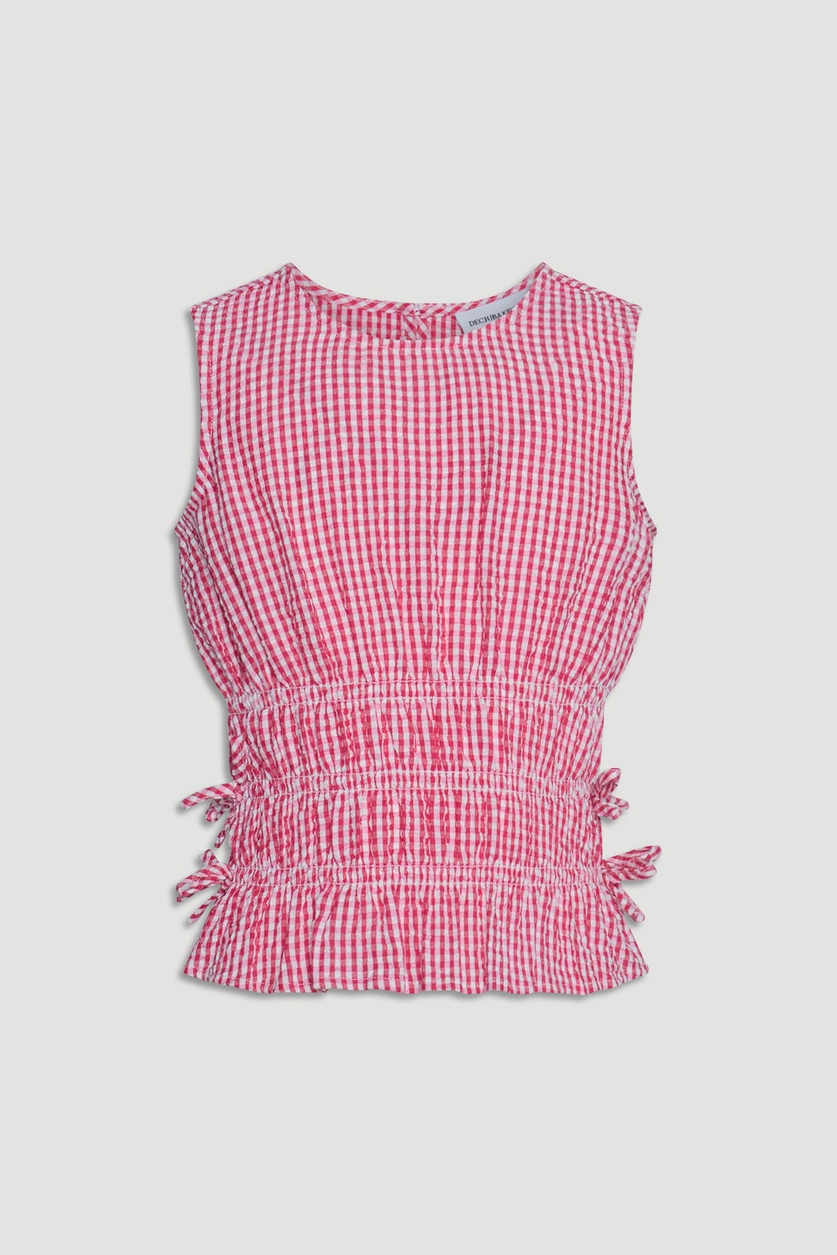 Sleeveless girls' top in red and white gingham with gathered waist ties and a ruffled hem for a playful look.