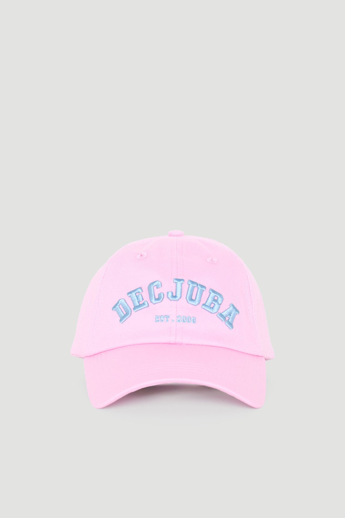 Soft pink varsity-style cap with bold blue embroidered lettering on front, perfect for casual girls’ wear.