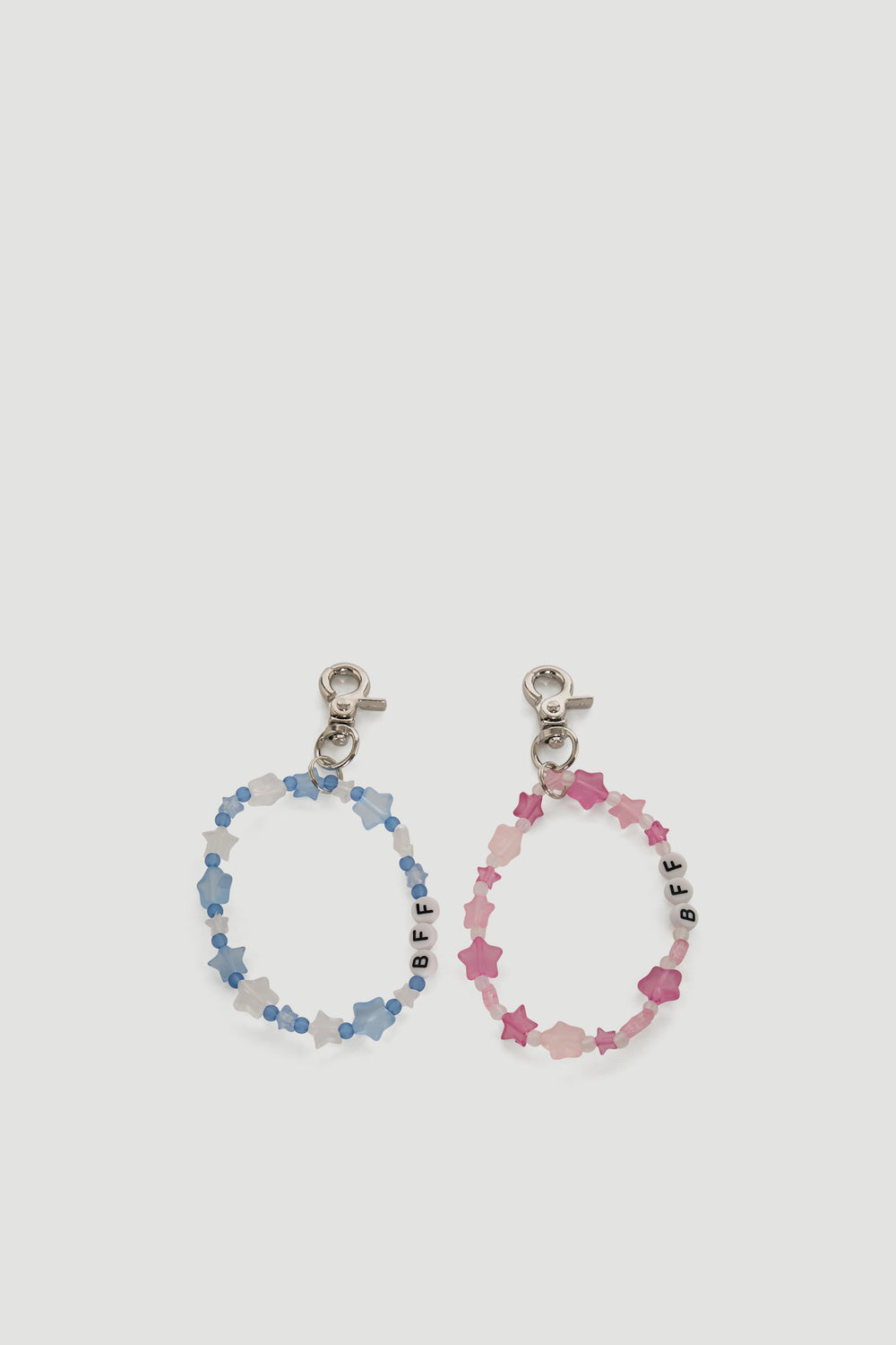 Set of pink and blue beaded bag charms with star shapes and BFF letter beads on silver clips.