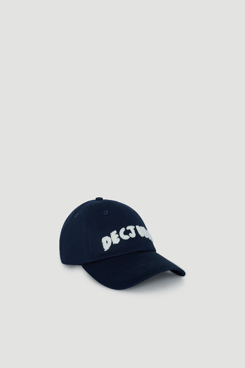 Navy cap with white fuzzy lettering detail, designed for girls with a classic curved brim and adjustable back strap.