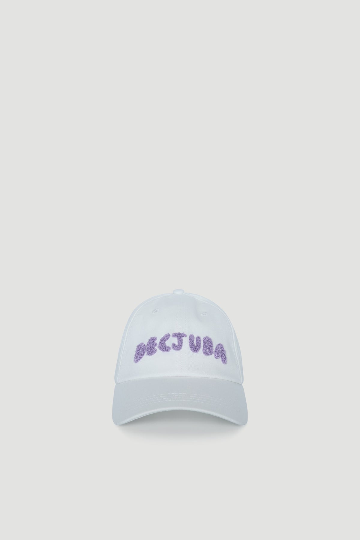 White cap for girls featuring textured lilac lettering for a cozy, casual look.