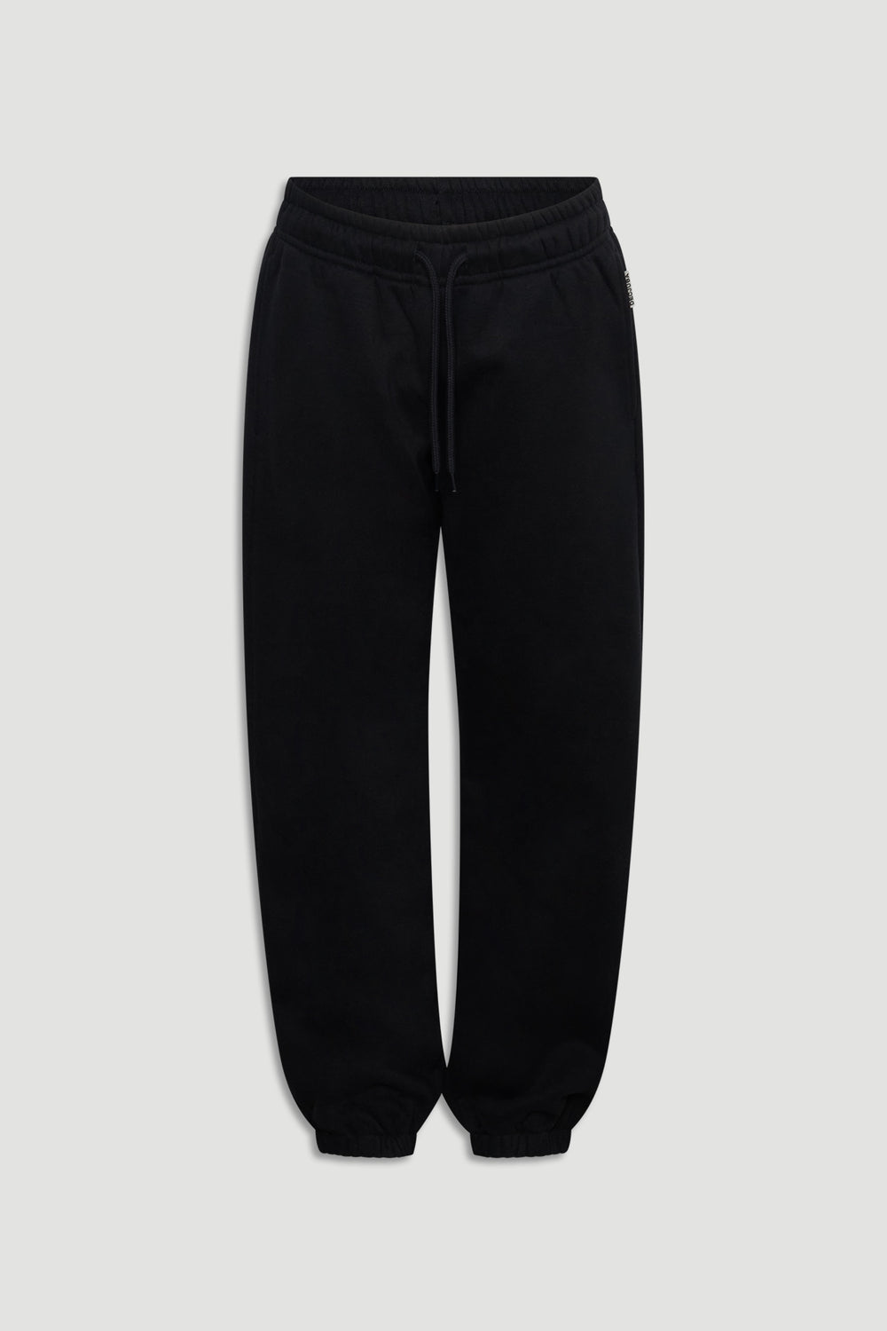 Classic black track pants for girls with elastic cuffs and a comfortable drawstring waist for easy wear.