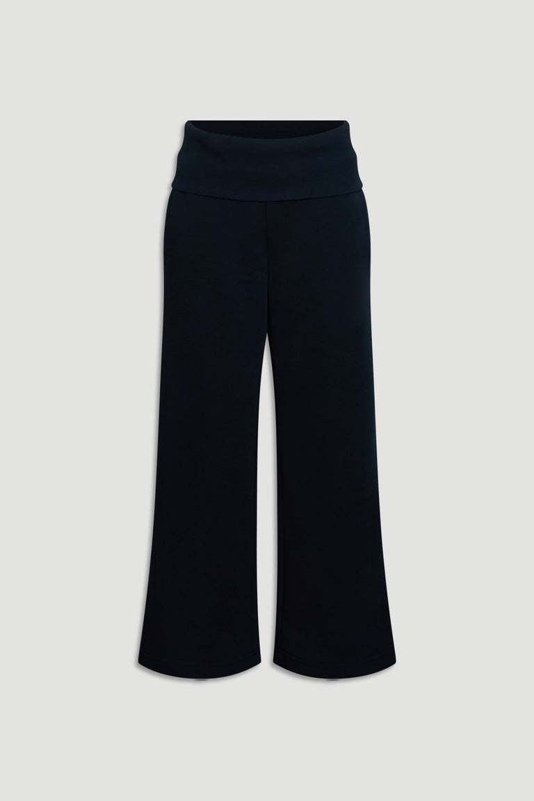 Navy blue rolled waist pants for girls, featuring a relaxed fit and soft, comfortable fabric for everyday wear.