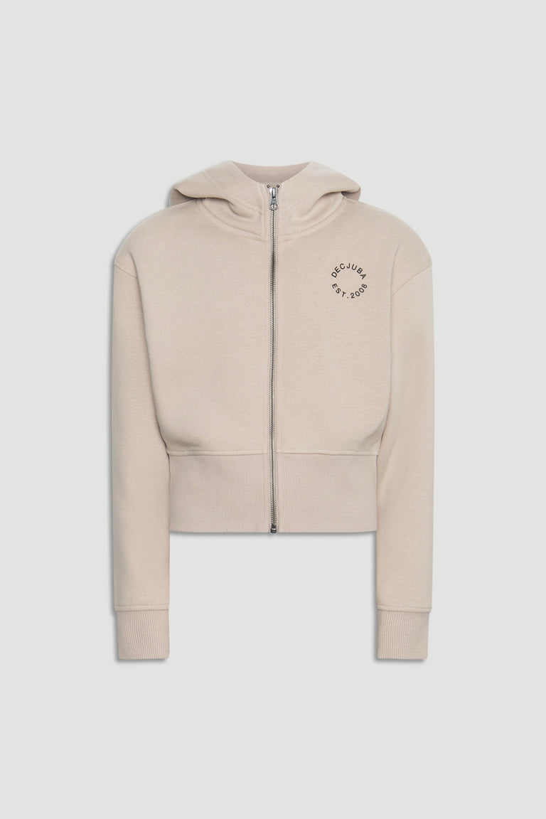 Light beige cropped zip-up hoodie with hood and subtle logo detail, designed for a trendy girls' casual look.