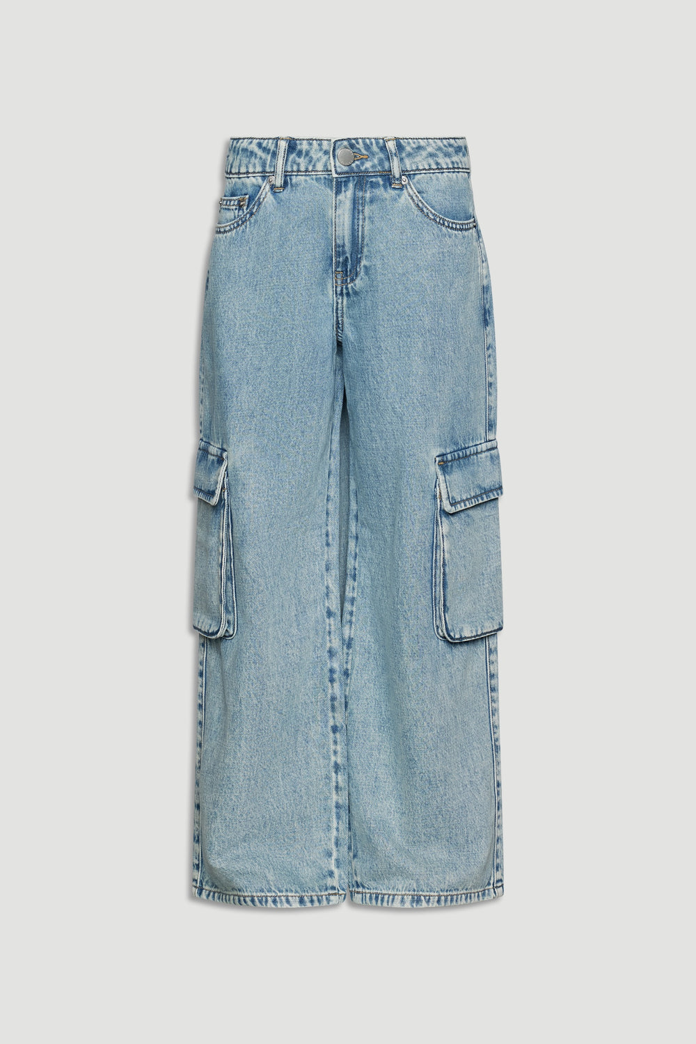 Light wash denim cargo pants for girls featuring wide legs and spacious side pockets with flaps.