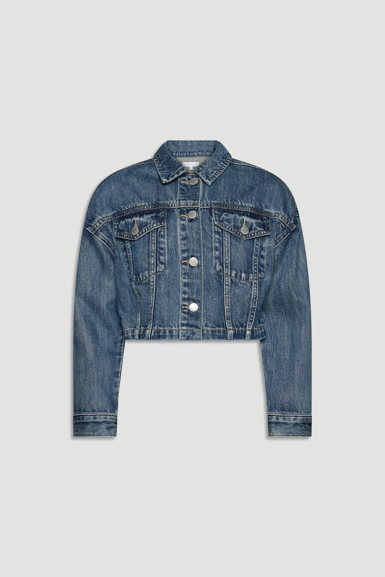 Cropped girls denim jacket in classic blue wash with button front and chest flap pockets for casual layering.