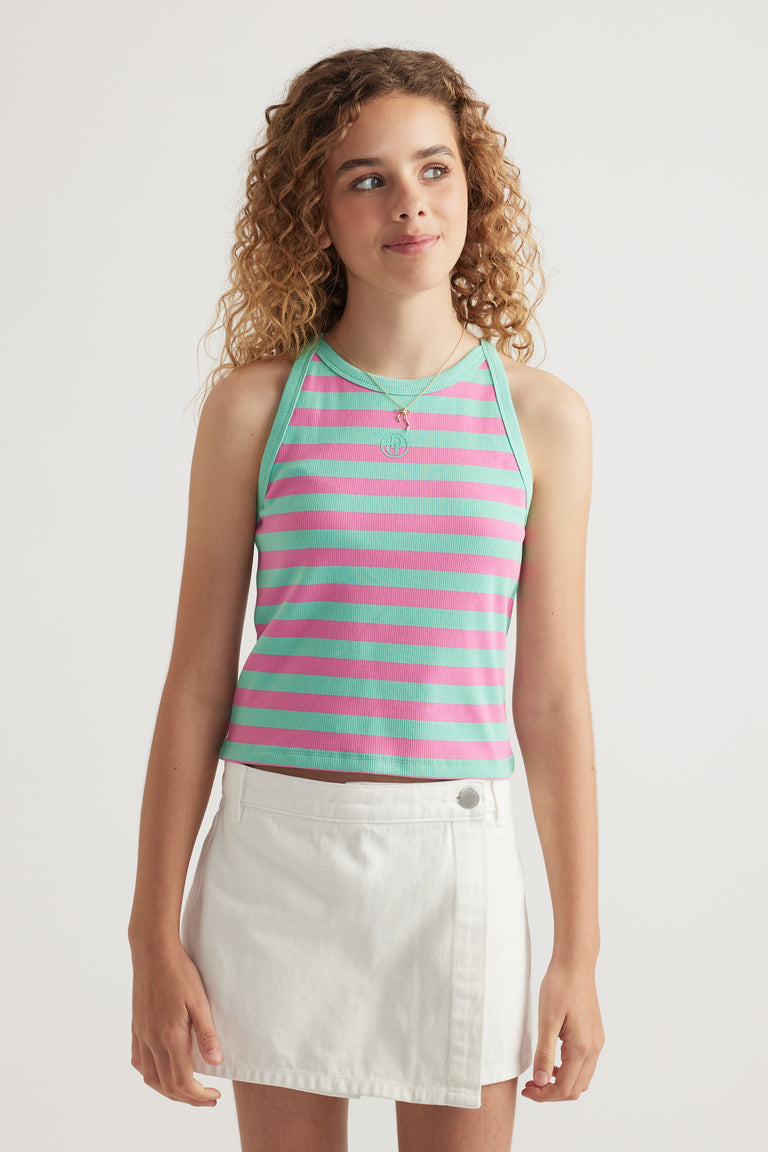 Girl wearing a mint green and pink striped rib racer tank with a white skirt