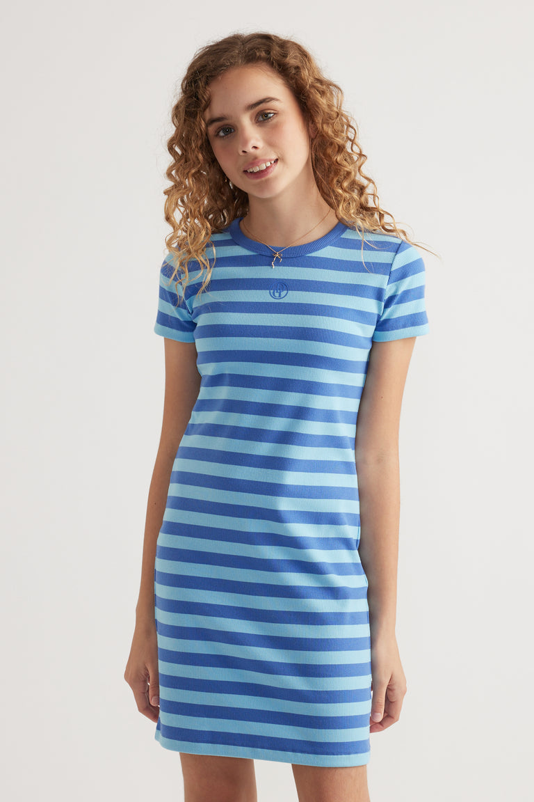 Girl wearing a blue and light blue striped ribbed T shirt dress with short sleeves and an above knee hem