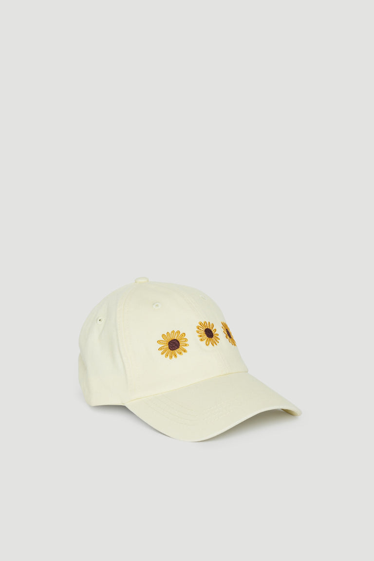 Girls cream baseball cap with sunflower motifs and curved brim
